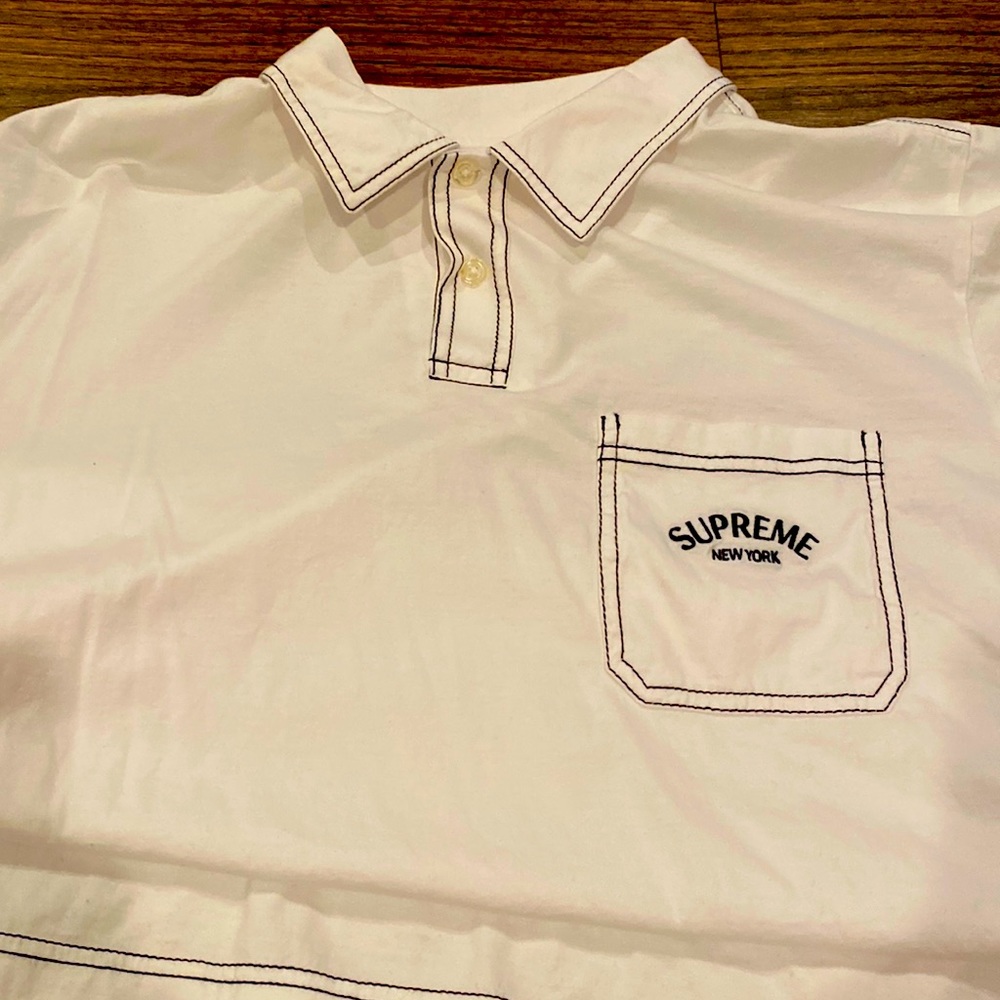 Supreme White Polo Shirt with Black stitching. Size Large